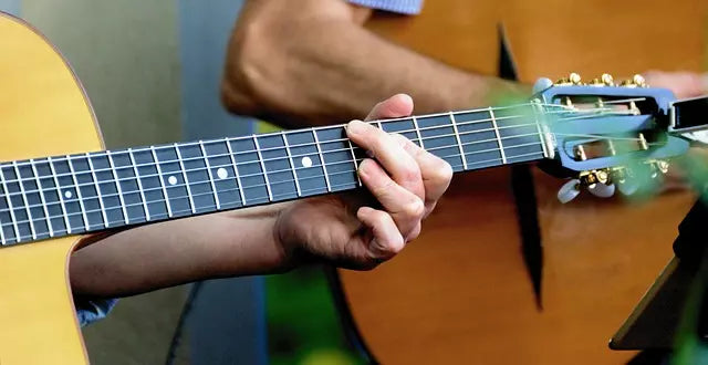 Introducing Guitar Grip Strengthener: The Ultimate Tool for Guitarists to Enhance Technique and Performance